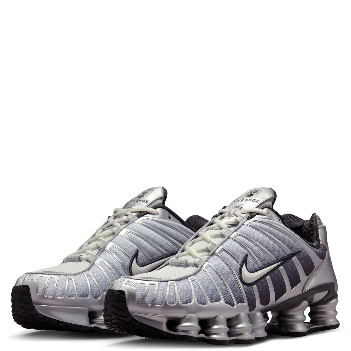 Men's Nike Shox TL metallic silver sneakers, two front pods and Nike swoosh detail