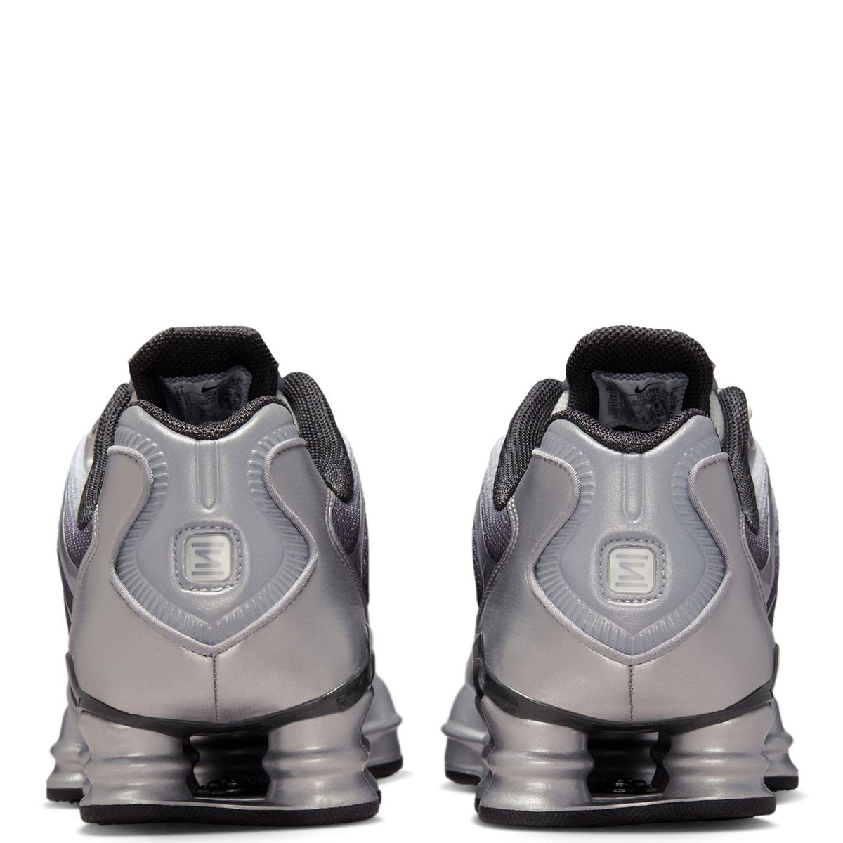 Men's Nike Shox TL metallic silver sneakers with rear Shox pods and padded collar
