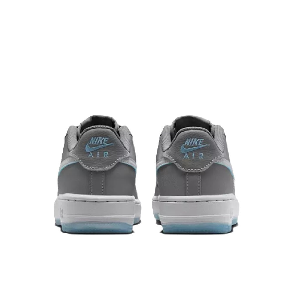 Big Kid's Nike Air Force 1 SE heel view in gray with Nike Air and blue trim