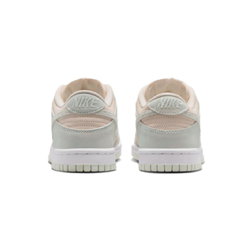 Big Kid's Nike Dunk Low sneakers, rear view with Nike logo and cushioned collar padding