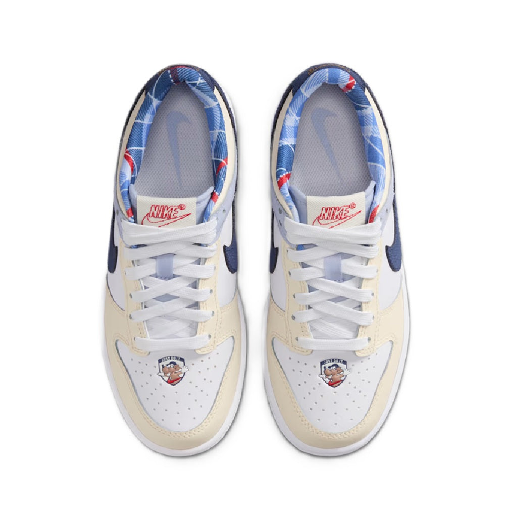 Kids' Nike Dunk Low sneakers, top view with white laces and navy heel overlays