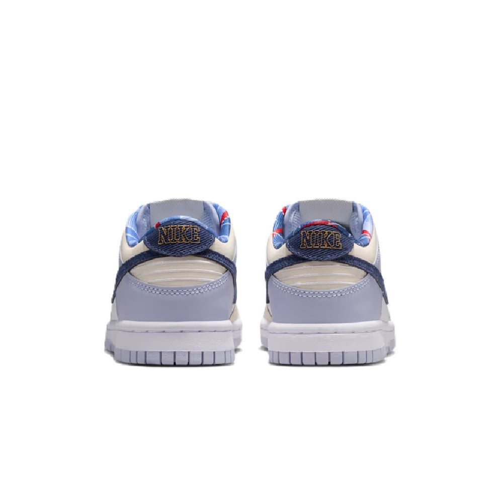 Kids' Nike Dunk Low sneakers, rear view with navy heel and white rubber sole