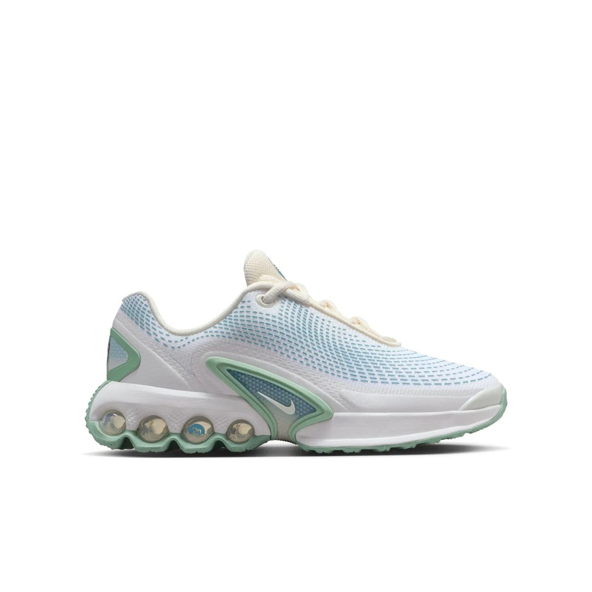 Kids' Nike Air Max DN sneakers, side view with light blue knit, gray panels, green trim