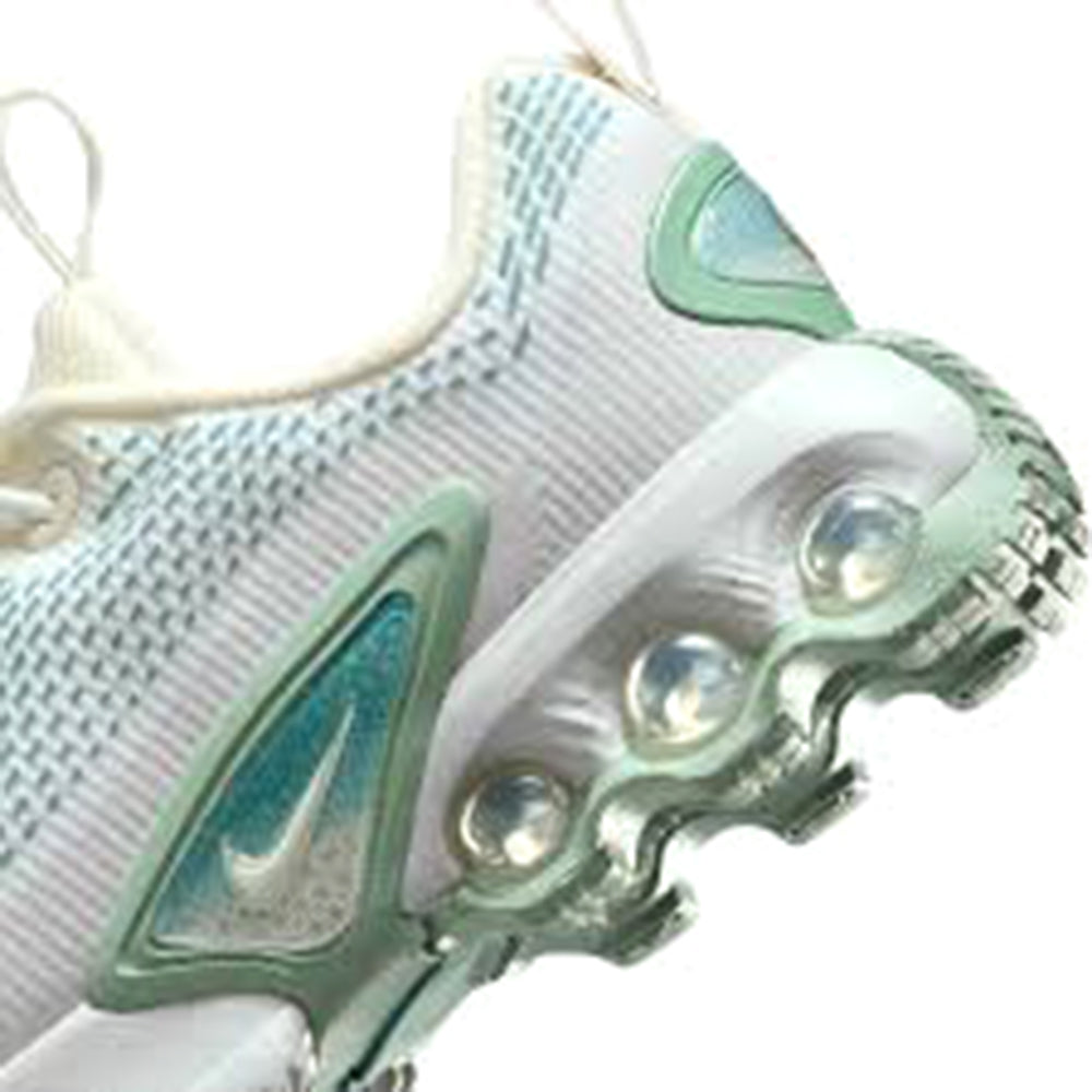 Close-up of kids sneakers: light blue knit mesh upper with green swoosh and Air sole