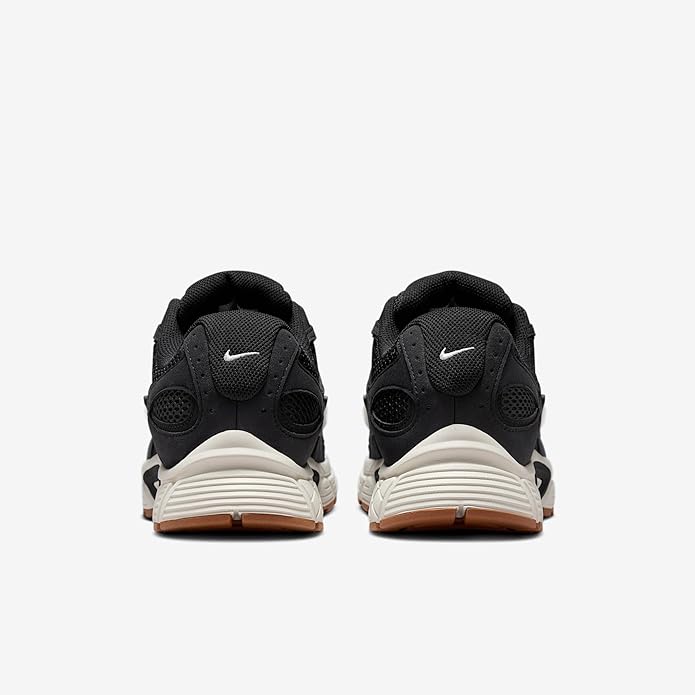 Nike men's running shoes, heel view: black fabric with white sole and gum-brown inserts