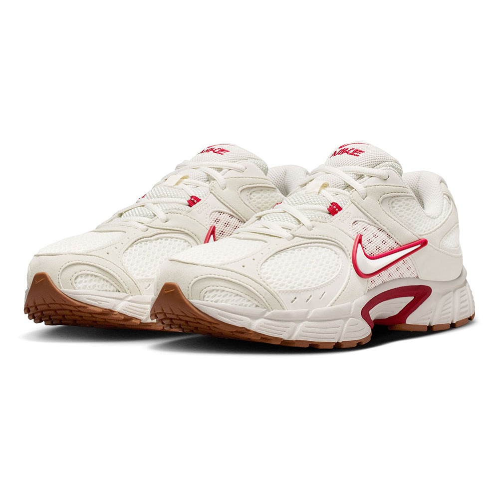 Pair of men’s Nike V5 RNR running shoes in light bone with red swoosh