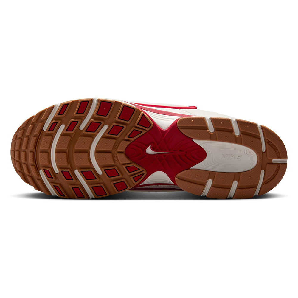Nike V5 RNR shoe outsole with brown tread and red midfoot accents