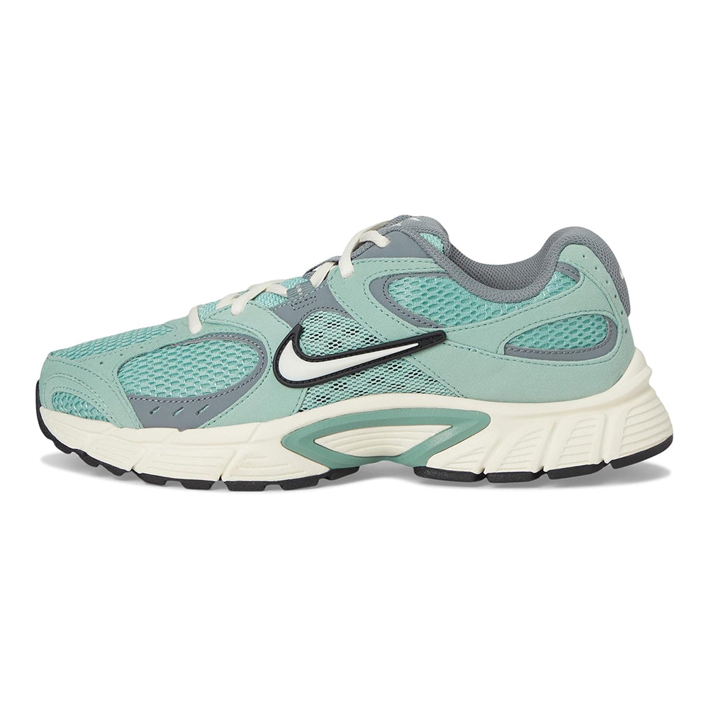 Women's Nike lace-up running shoes in mint and pale ivory, mesh upper and cushioned sole