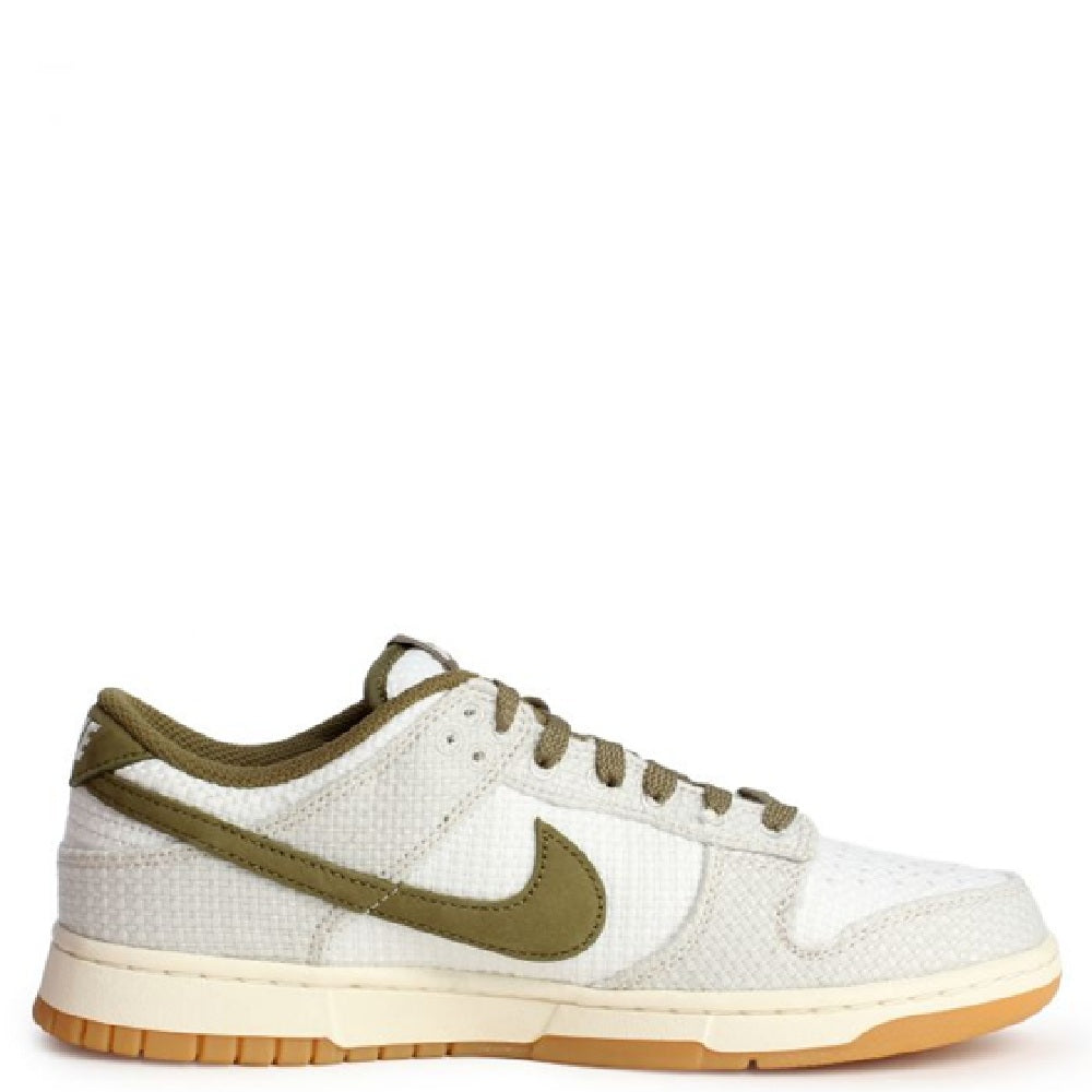 Nike Dunk Low Retro SE sneakers in off-white with olive swoosh and gum sole.