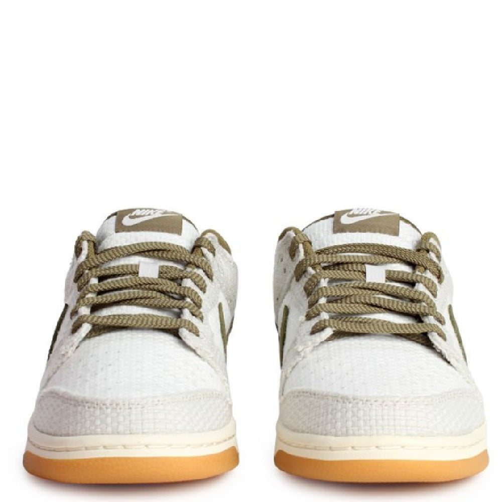 Nike Dunk Low Retro SE sneakers, off-white toe box with olive lace eyelets.