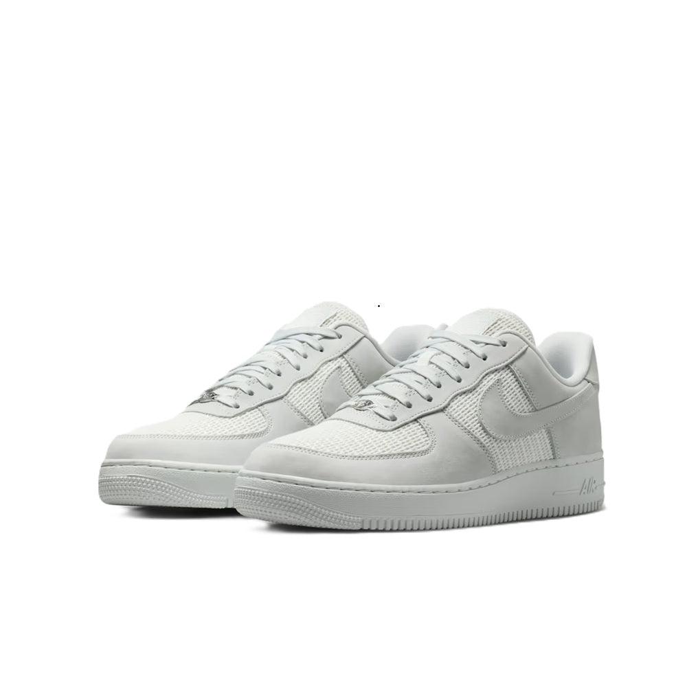 Air Force 1 low-top sneakers, pair front view with lace-up closure and cupsole
