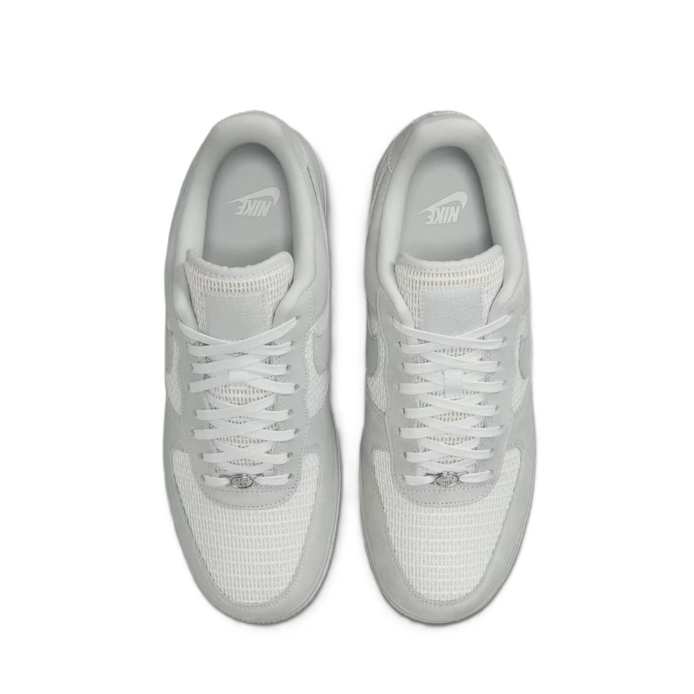 Air Force 1 low-top sneakers, top view with white laces and textured upper