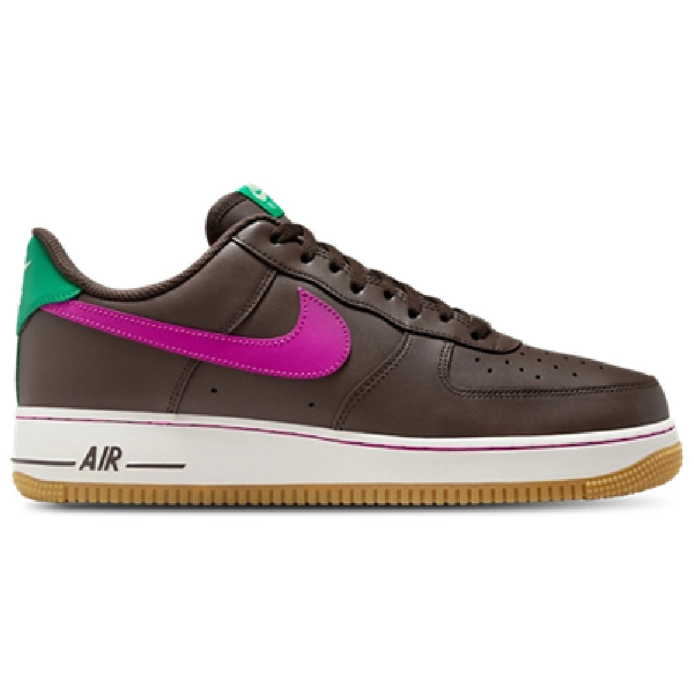 Brown low-top sneakers with magenta swoosh, green heel tab, lace-up design