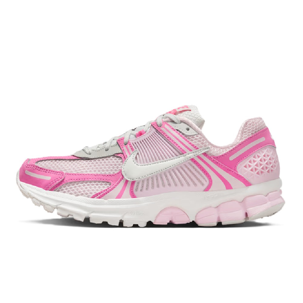 Women's Nike Zoom Vomero 5 running shoes, pink mesh upper with gray overlays.