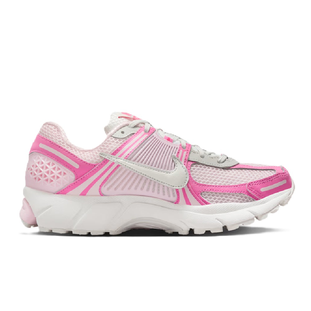 Women's Nike Zoom Vomero 5 running shoes, side profile in white, pink, and gray.