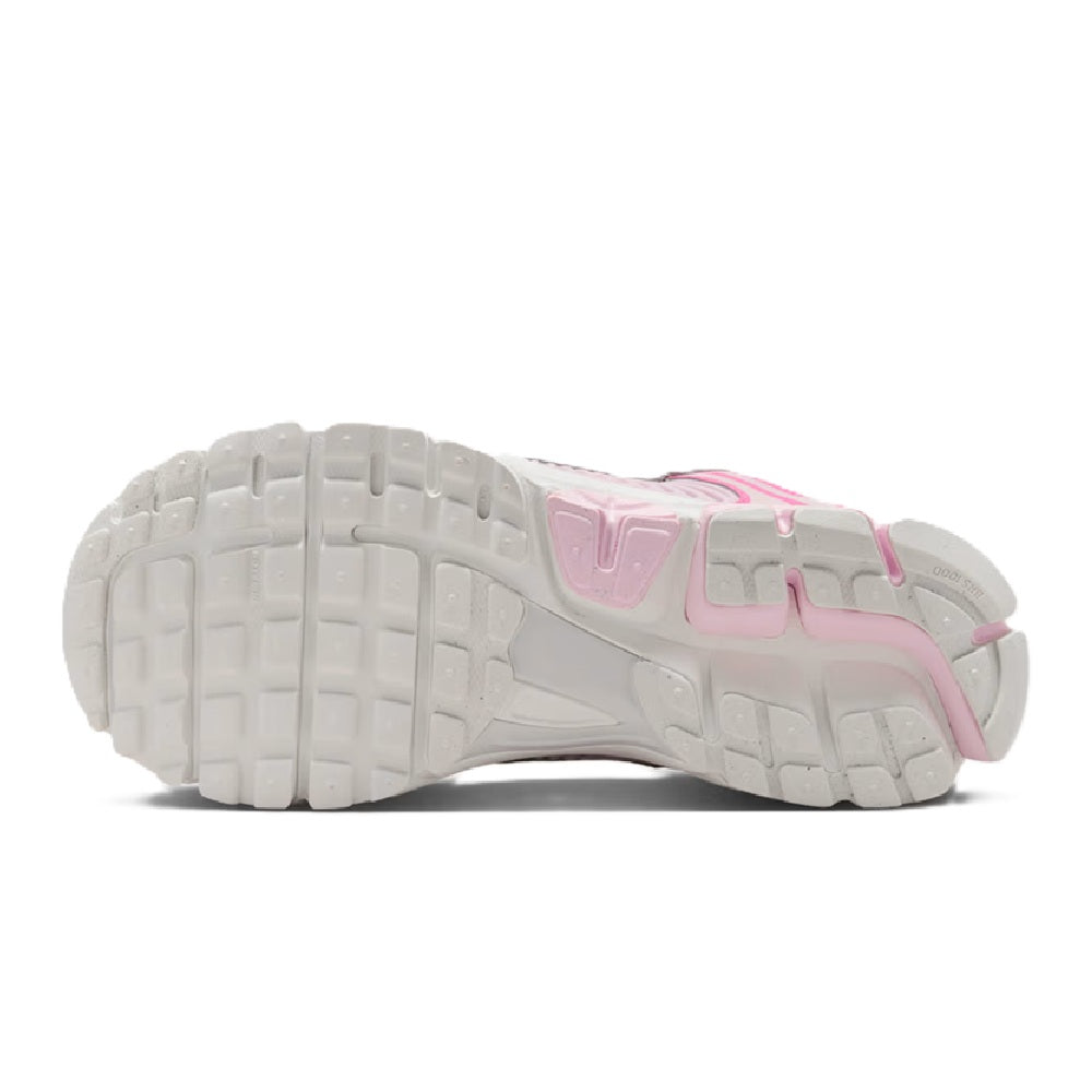 Women's Nike Zoom Vomero 5 sneakers, pink-and-white outsole and heel section.