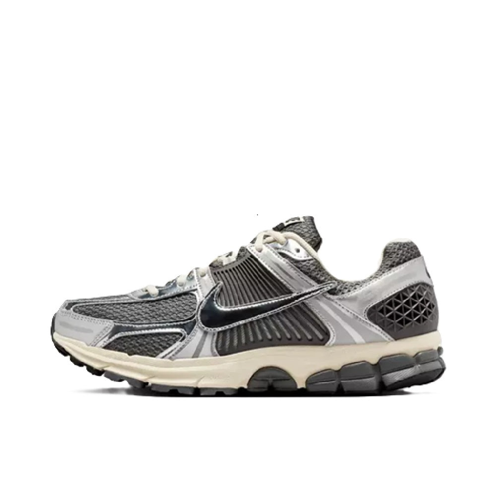 Men's running shoes in iron gray with black Nike swoosh and lace-up design