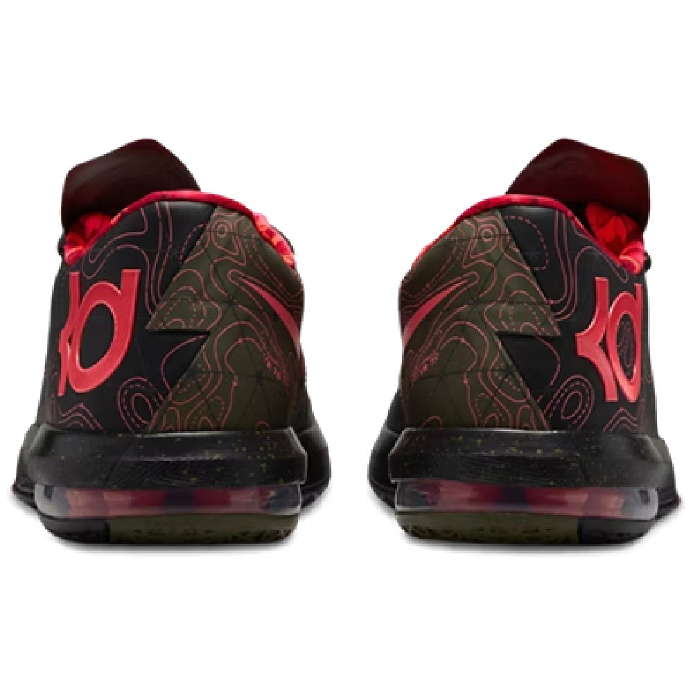 Back view of black heel with red interior lining and patterned heel panels