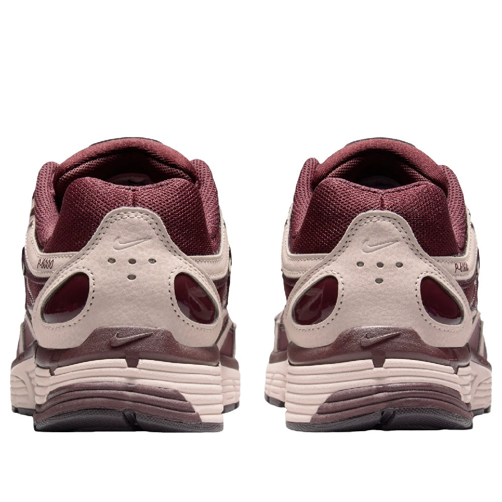 Women's Nike P-6000 sneakers, rear view, burgundy and light gray with cushioned heel