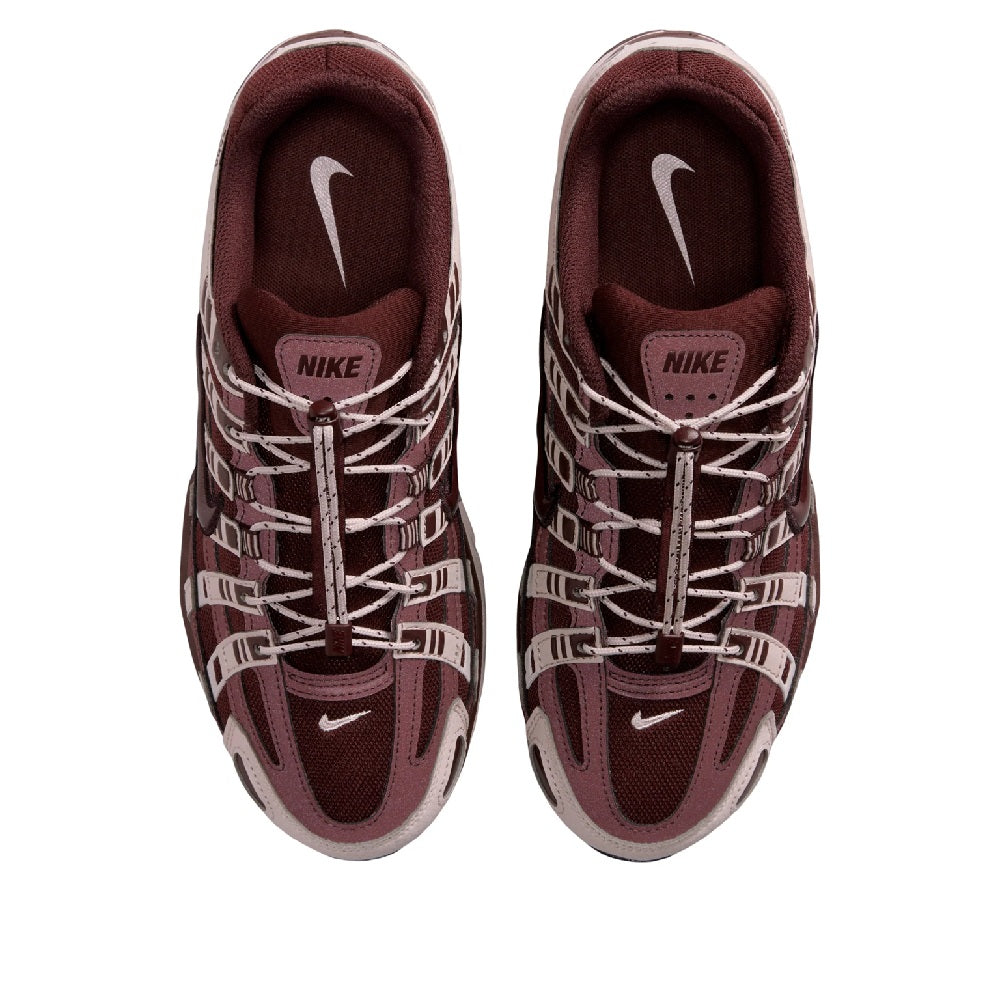 Women's Nike P-6000 sneakers, toe and side view, burgundy uppers with Nike swoosh