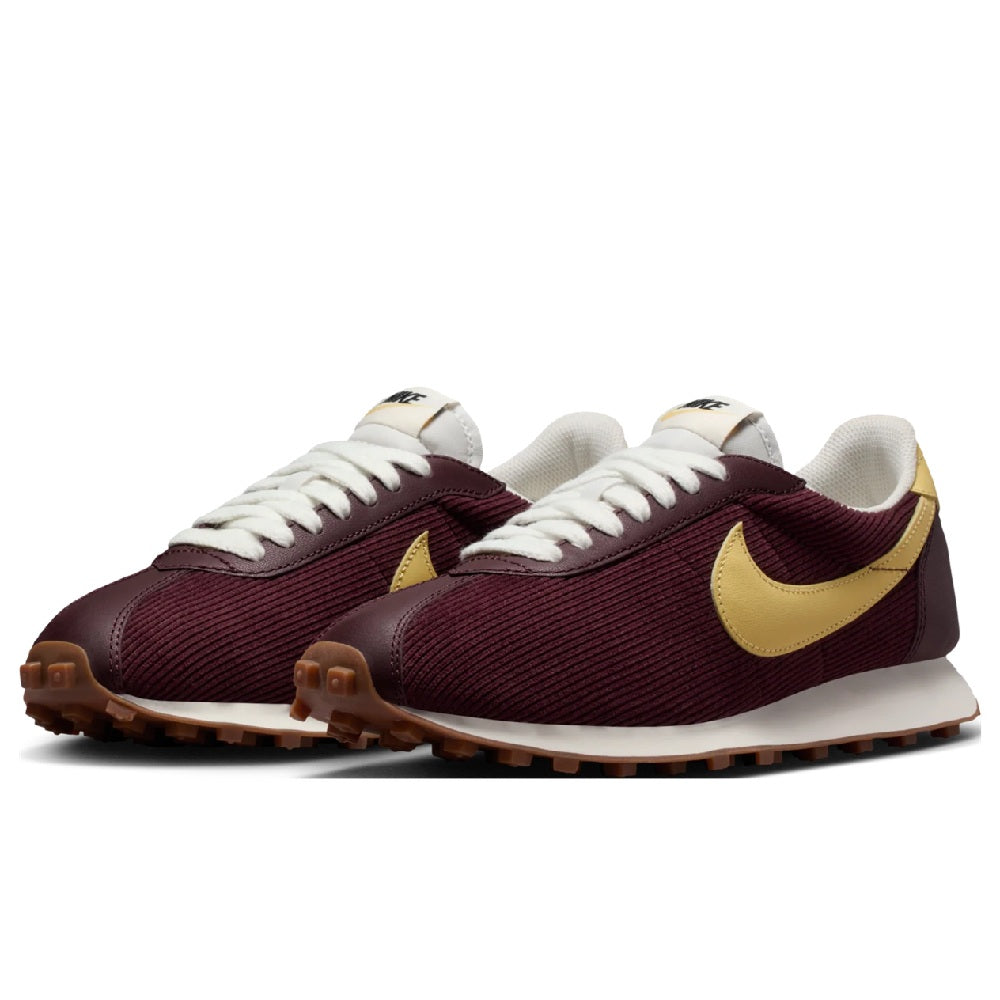 Women's Nike LD-1000 burgundy knit sneakers pair with soft yellow swoosh
