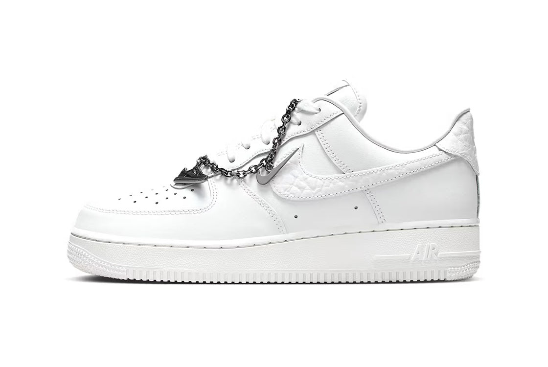 White Nike Air Force 1 low-top sneaker with side Swoosh and lace-up front