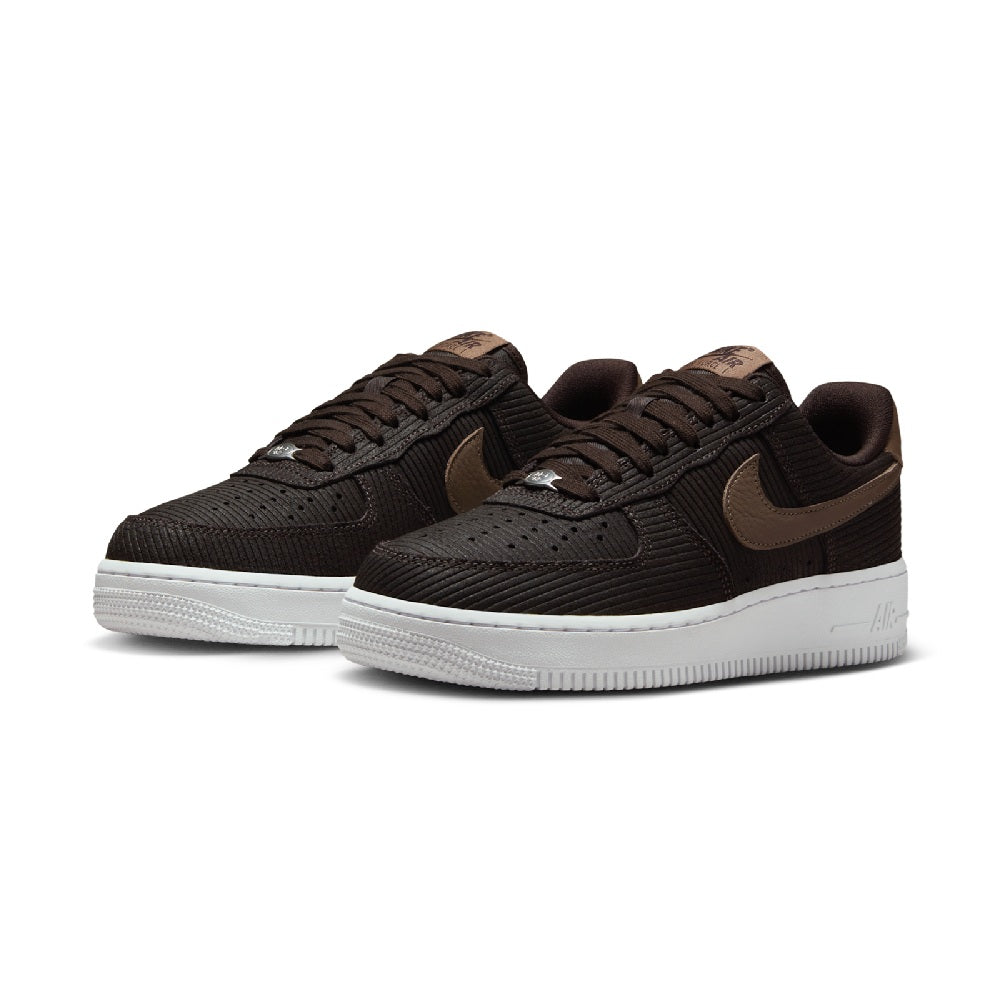 Pair of Nike Air Force 1 low-top sneakers in dark brown with tan accents and white soles