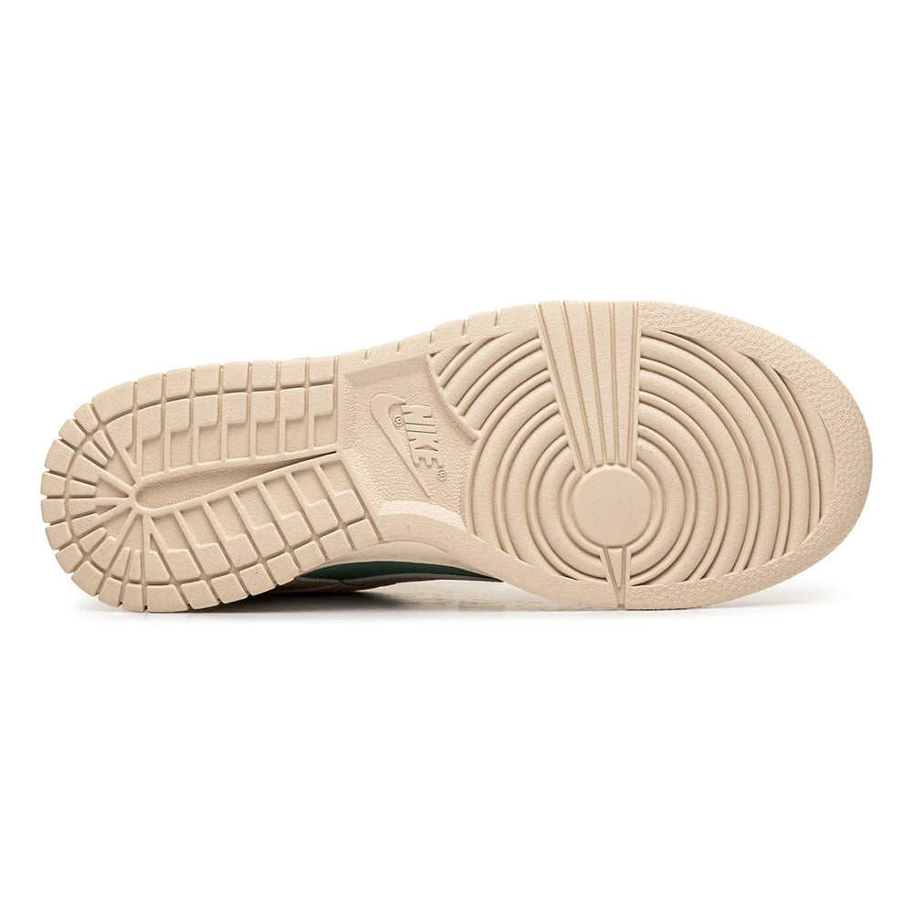 Nike Dunk Low rubber outsole in light tan with grid tread.