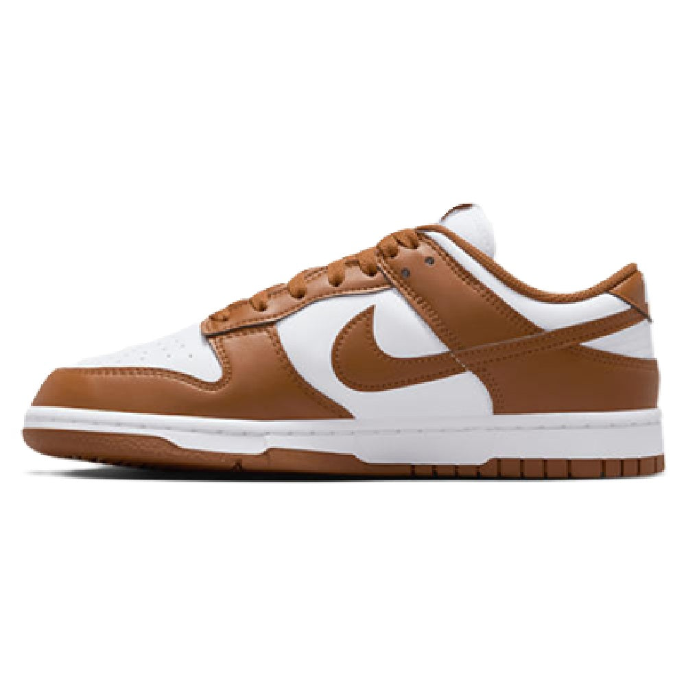 Side view Nike Dunk Low sneakers with tan overlays, white panels, and cupsole