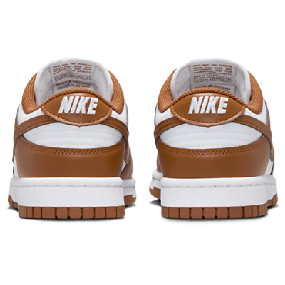 Nike Dunk Low heel and tongue, tan leather with white panels, Nike branding on collar
