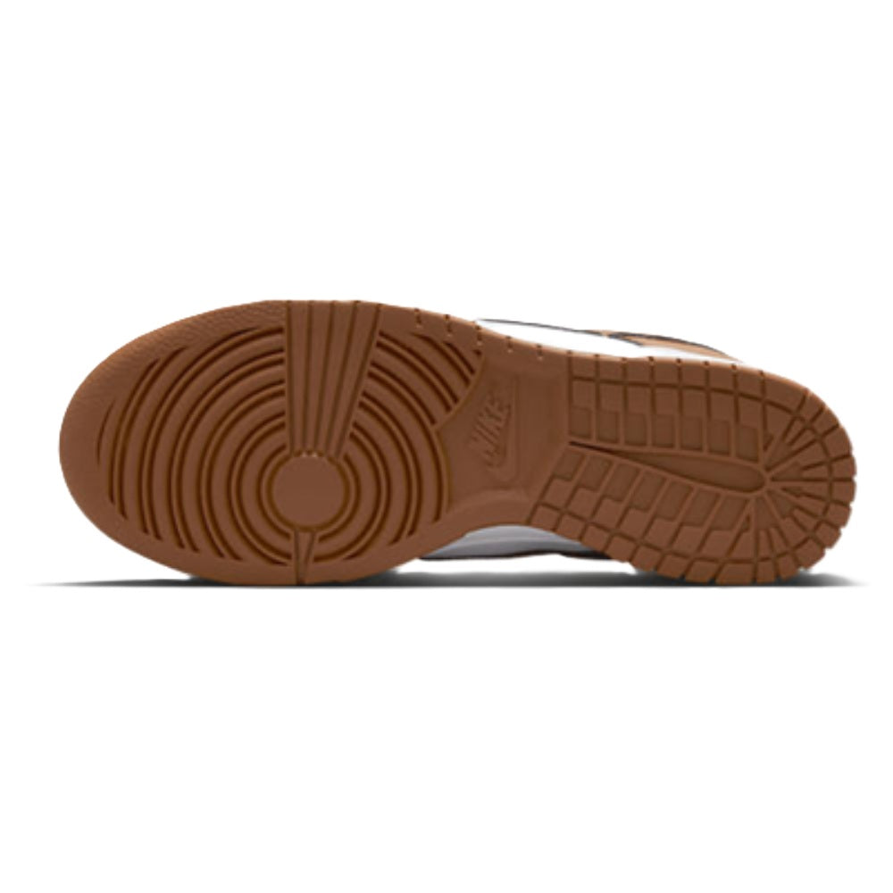 Nike Dunk Low rubber outsole, textured traction in brown with striped tread pattern