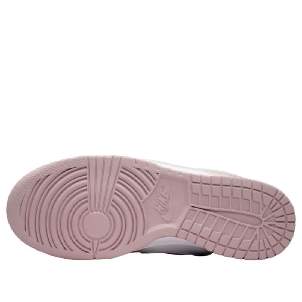 Nike Dunk Low rubber outsole in pale pink with textured traction grooves