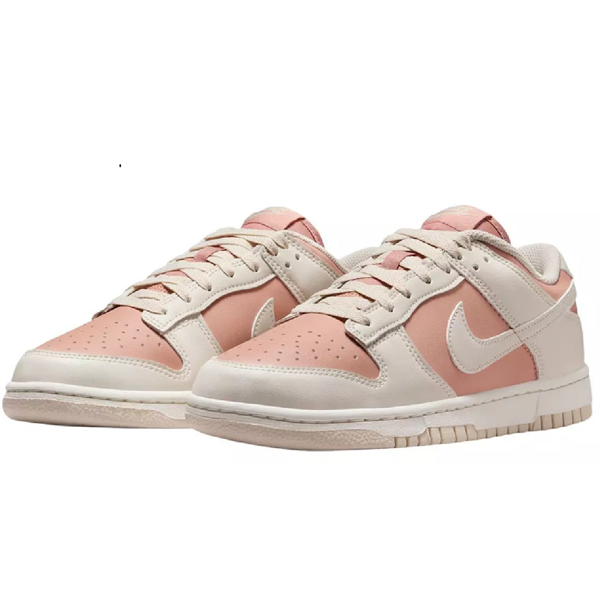 Nike Dunk Low sneakers, side view in white with pink panel accents and white laces