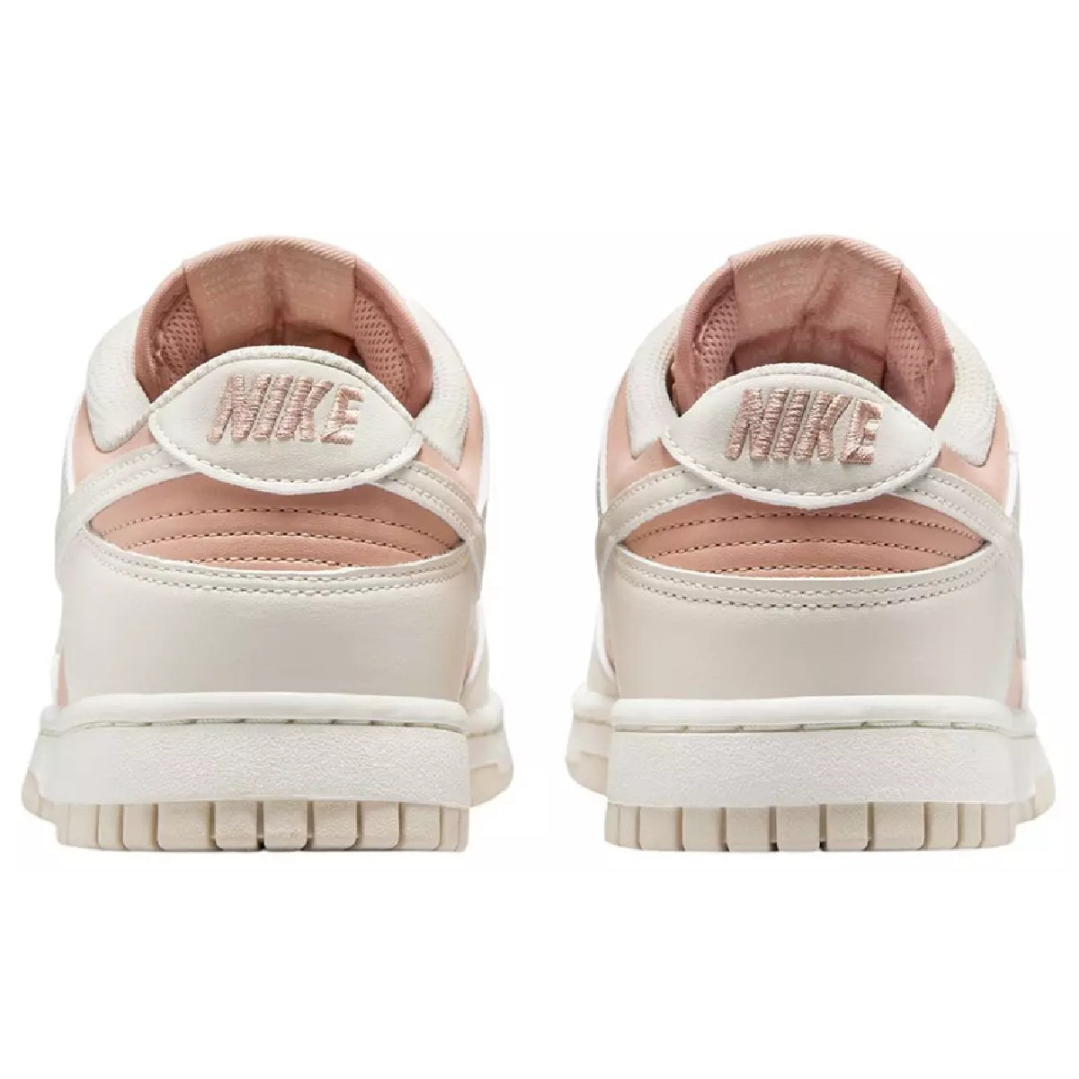 Nike Dunk Low sneakers, heel view in white leather with pink collar lining and Nike label