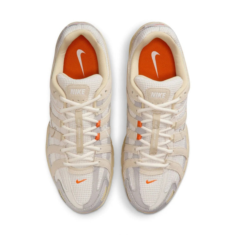 Nike P-6000 lace-up sneakers with orange interior and Nike logo on tongue