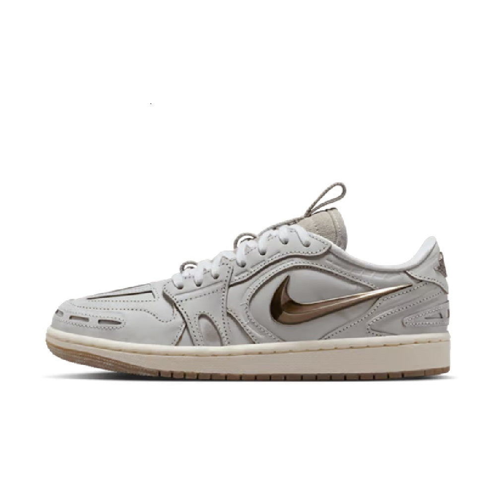 White low-top sneakers with gold Nike swoosh, lace-up front, and gum sole