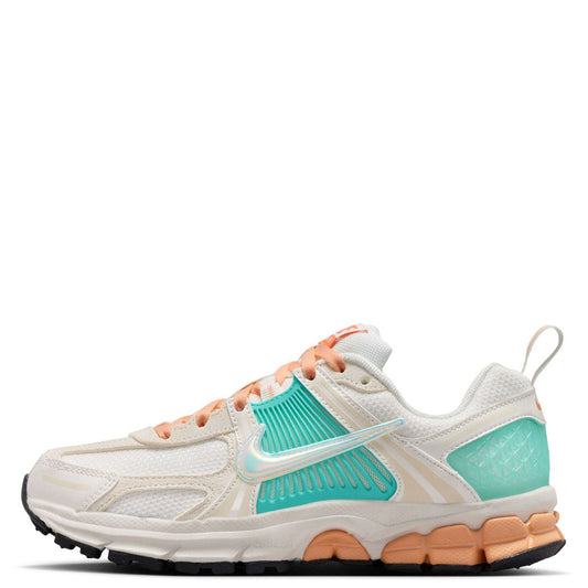 Kids' Nike running shoe in sail with orange laces, teal logo, turquoise panels.