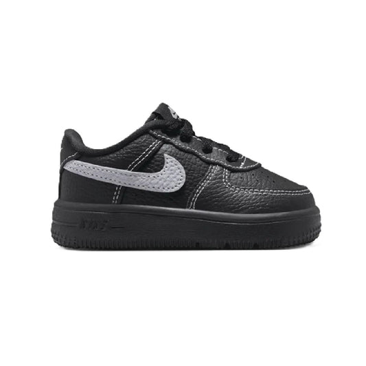 Kids' Nike Force 1 Low sneakers in black with light gray swoosh, lace-up.