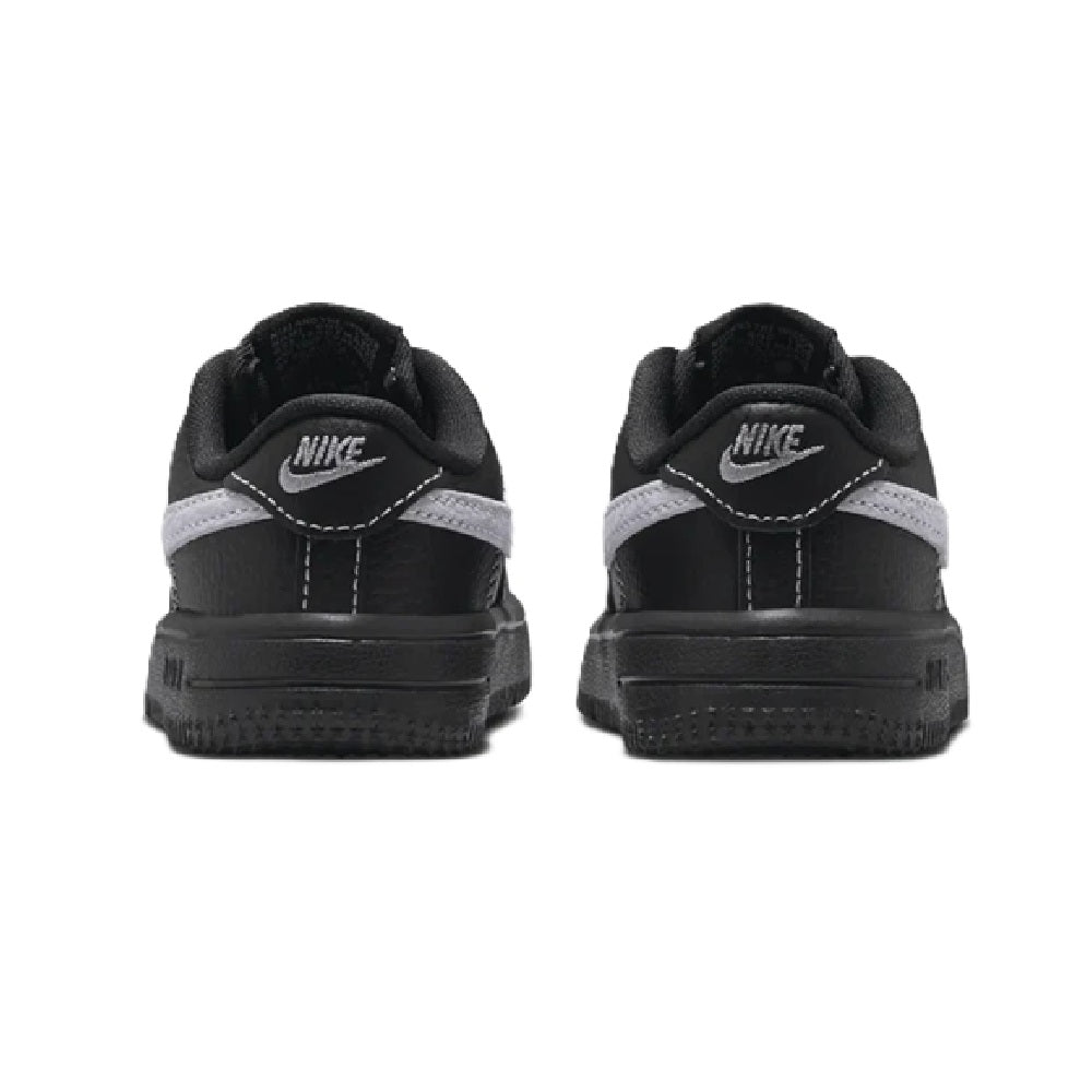 Kids' Nike Force 1 Low sneakers, black heels with Nike logo and light gray trim.