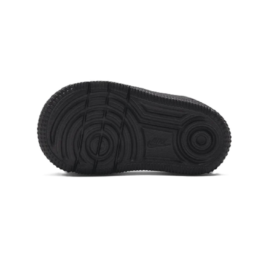 Kids' Nike Force 1 Low sneaker outsole, dark rubber tread bottom view.