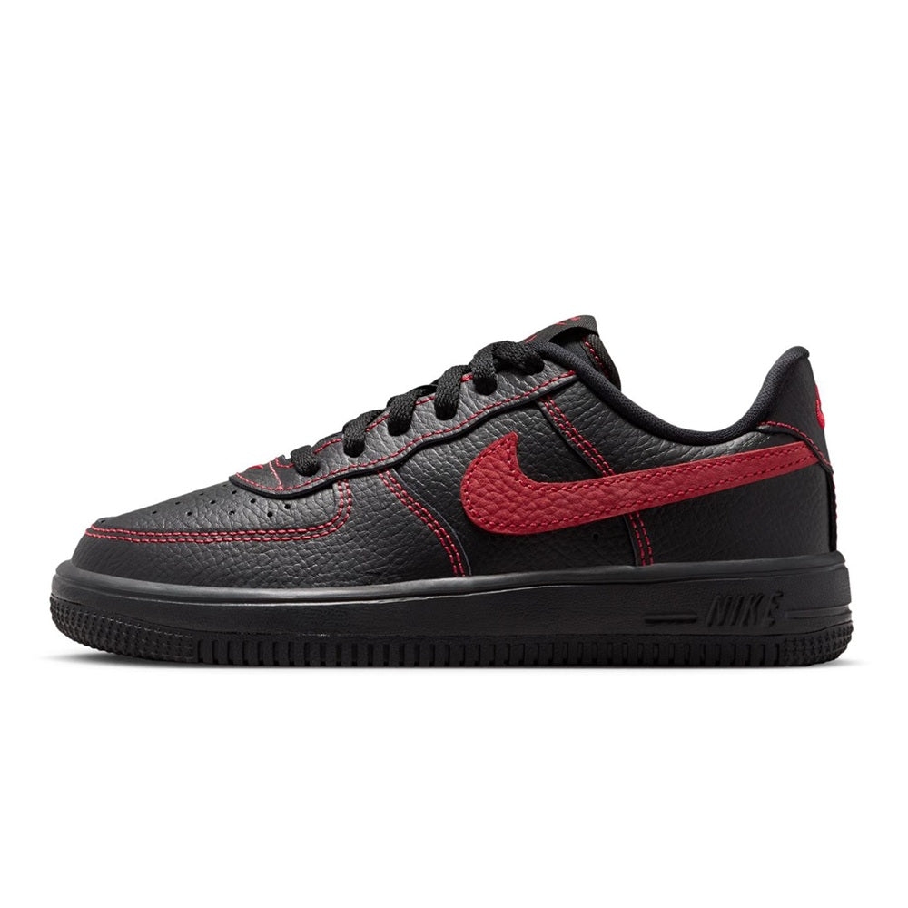 Kids' low-top Nike sneakers, black with red swoosh and stitched quarter panels