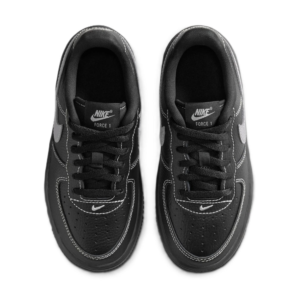 Black Nike Force 1 kids sneaker with Nike on tongue and lace-up closure