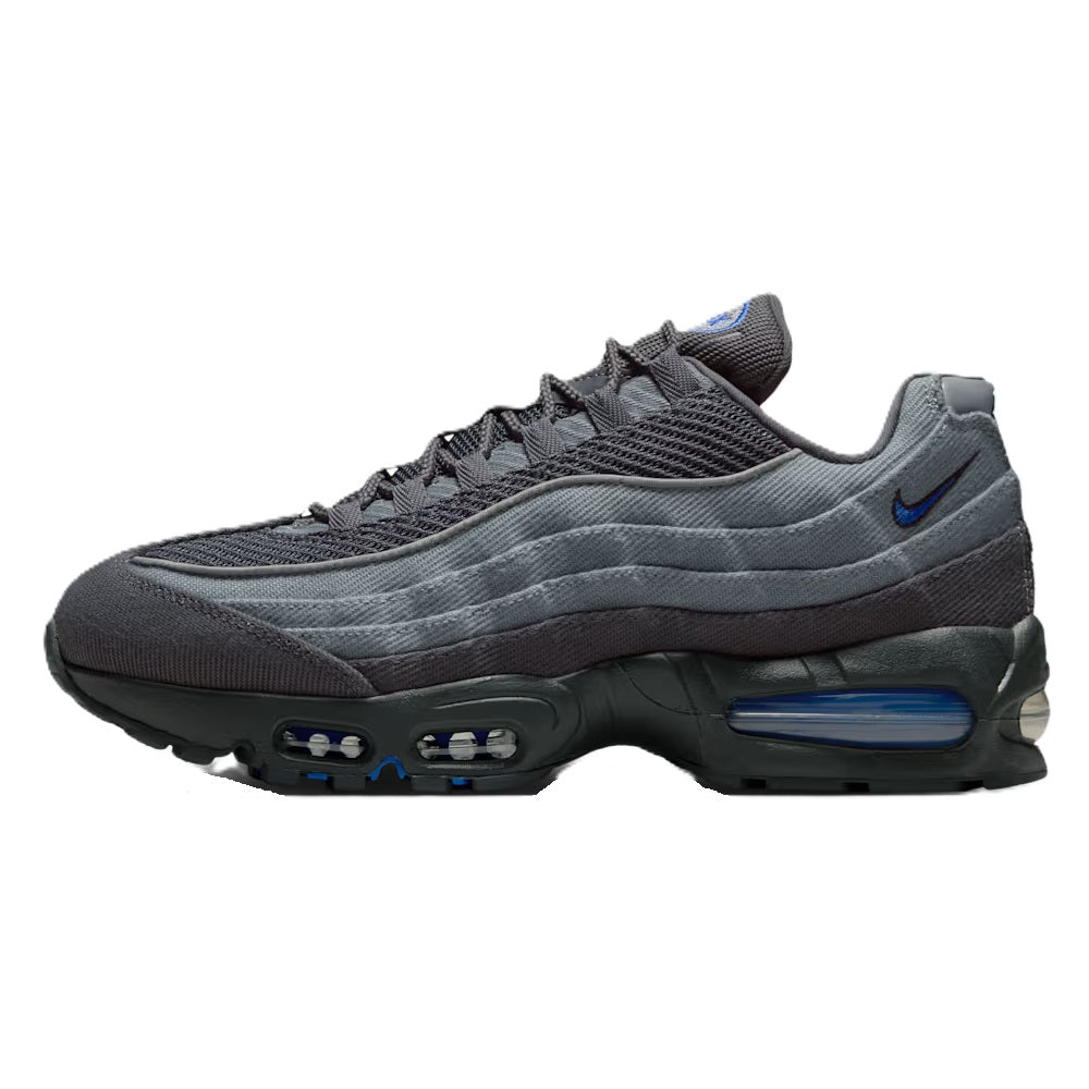 Nike Air Max 95 sneakers in smoke grey with blue accents and visible Air units
