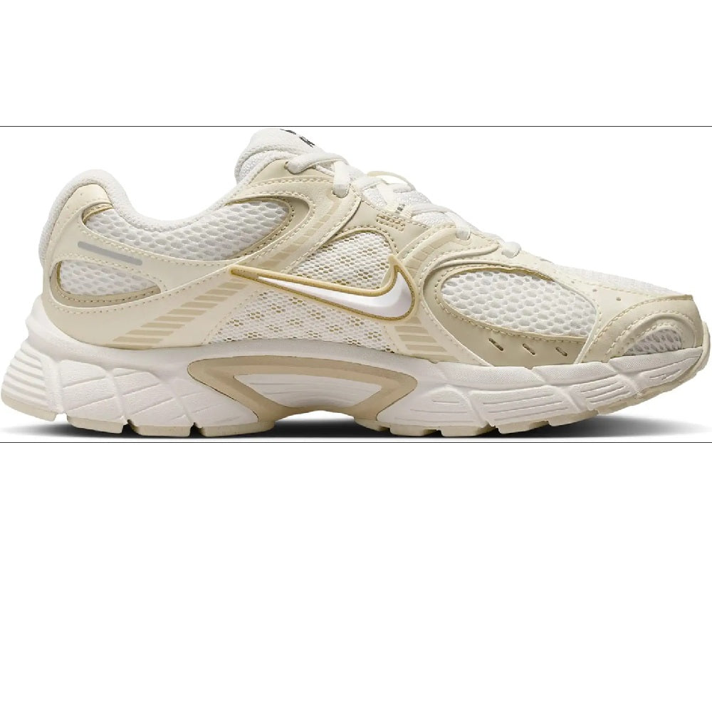 Women's Nike V5 RNR SE sneakers, side profile in light cream with gold accents