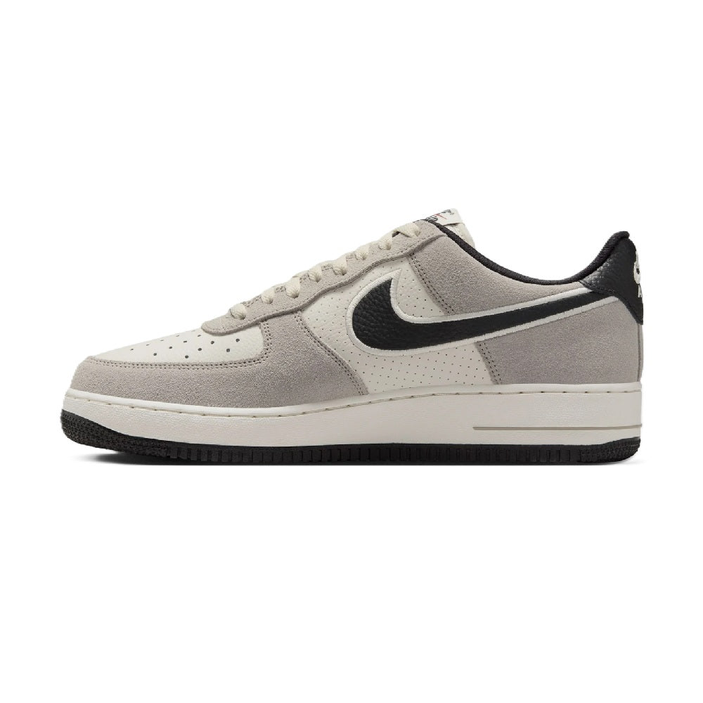 Men's Nike Air Force 1 low-top sneakers side view, light gray upper with black accents