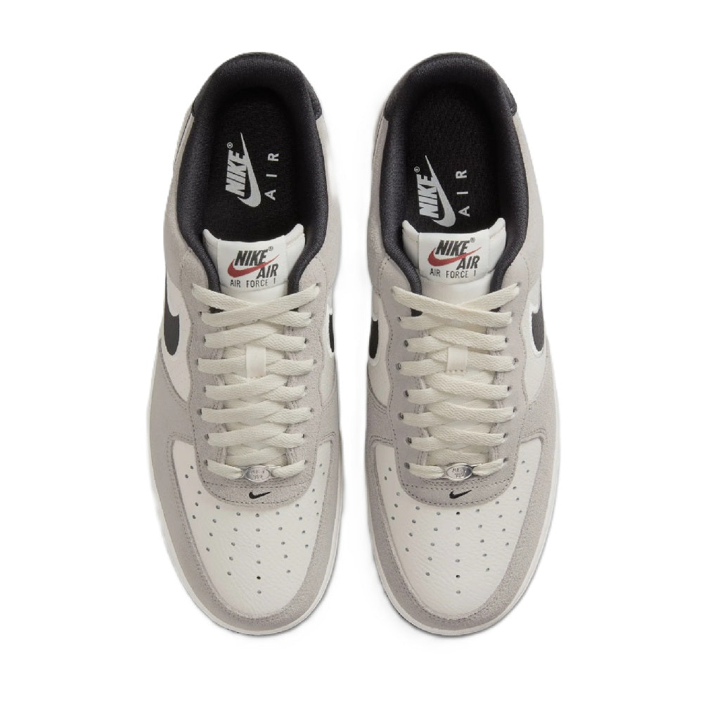 Men's Nike Air Force 1 low-top sneakers, lace-up pair with black interior lining
