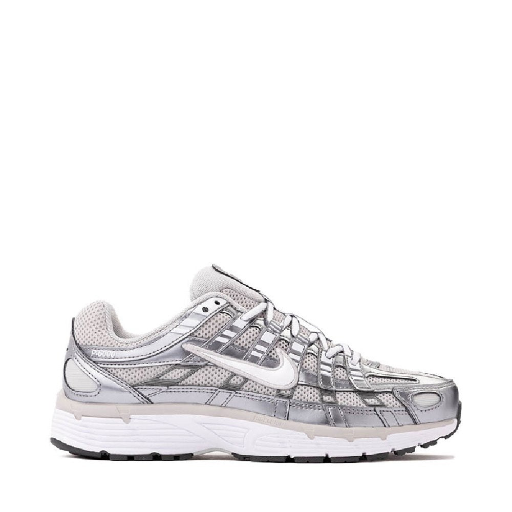 Women's Nike P-6000 running sneaker in grey with white accents and perforated panels