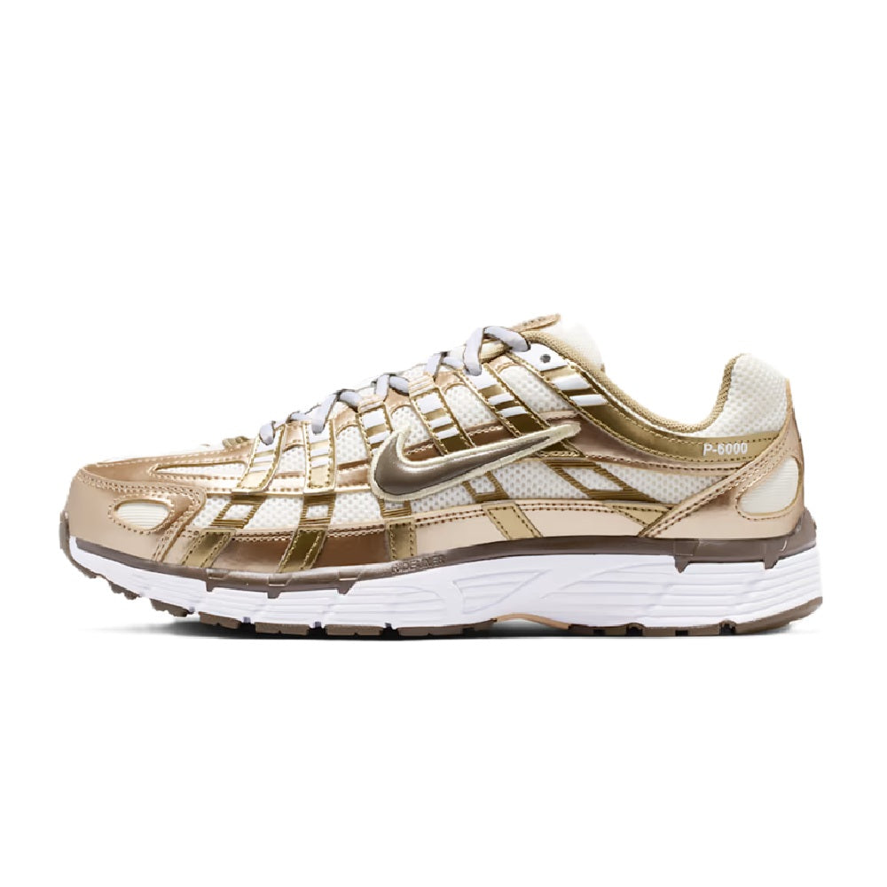 Women's Nike P-6000 sneakers with lace-up front, sail upper, and dark hazel accents
