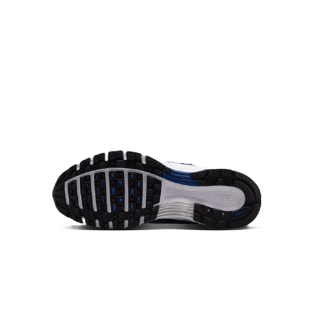 Nike P-6000 running shoe outsole view, blue-and-silver tread with heel branding