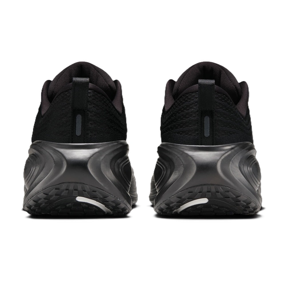 Men's Nike Vomero Plus QS sneakers, black heel view with gray traction detailing